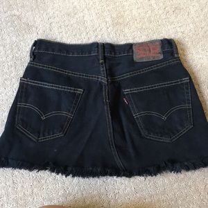 Levi’s black denim with yellow stitching